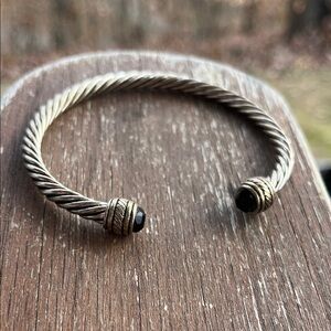 TWISTED CUFF BRACELET WITH MULTIFACETED BLACK GLASS BEADED ENDS